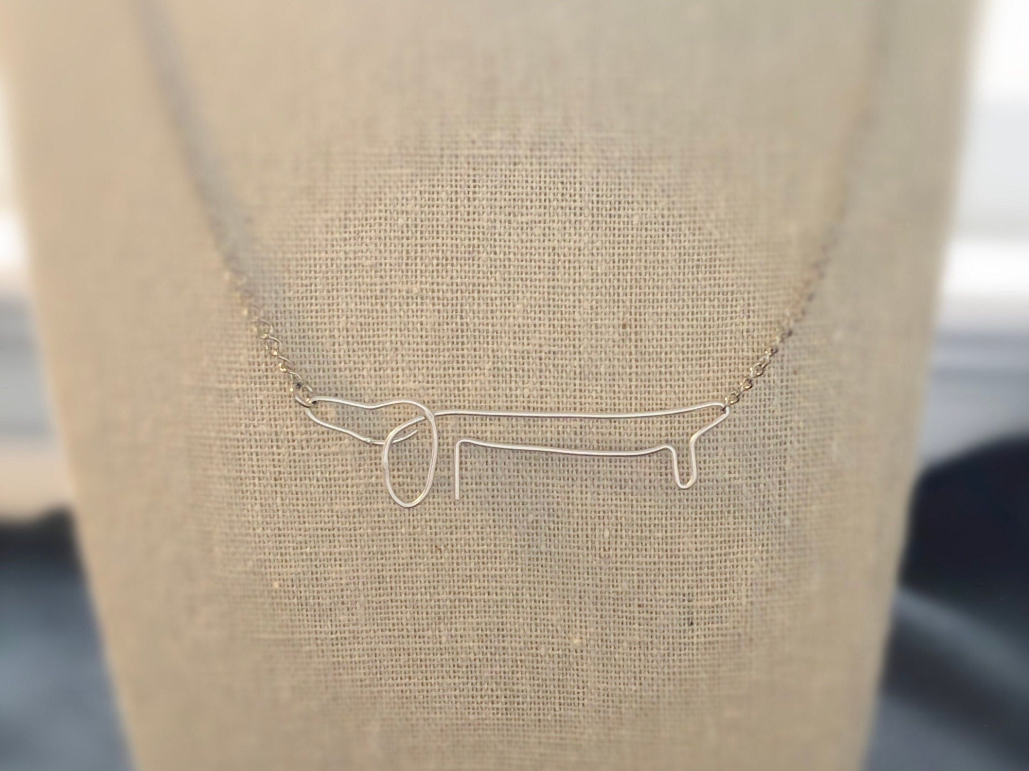 Sterling silver sausage dog dachshund gifts • Pablo Picasso doxie wearable art • Longhaired dachshund art • Picasso reproduction dachshund