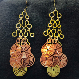 Bohemian style dangle earrings with spirals and geometric shapes